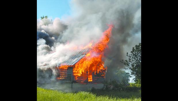 Members of the Rockwell Community Fire Department along with Swaledale Fire conducted a controlled training burn recently. Photo submitted by Josh Dannen.