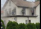 Many houses have porch roofs that have direct access to one or more bedrooms. Get to the porch roof by ground ladder or aerial.  Conducting VEIS maybe a good alternative tactic for search.